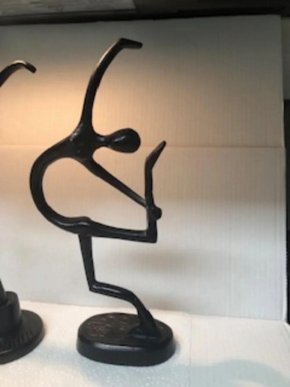 Three dancers female cast metal sculptures designed by Bodrul Khalique for IKEA